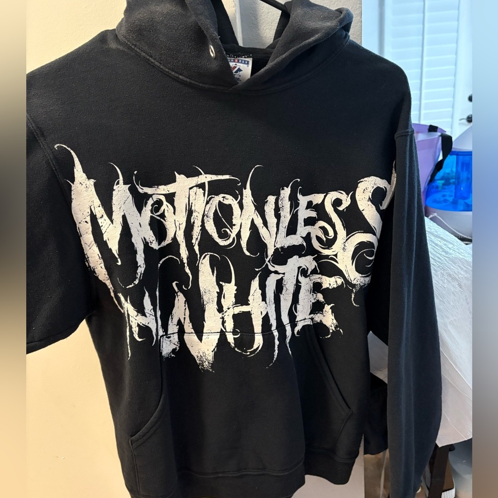 Motionless in white hoodie